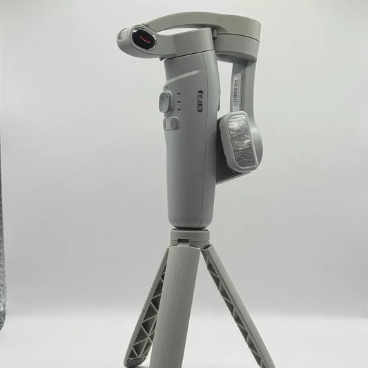 Side angle of 3-AXIS Merak One smartphone gimbal showing side zoom W T slider and clamp