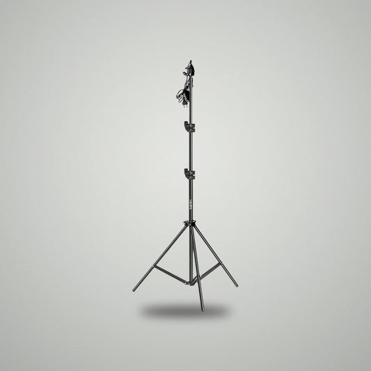 Full height view of BLUK'S black metallic adjustable studio light stand with power cable attached