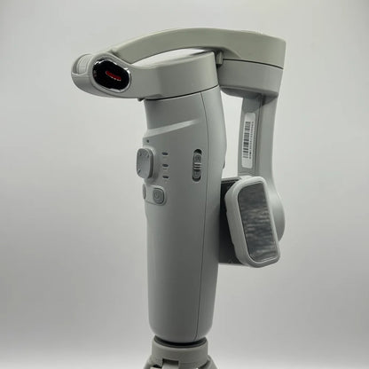 Close up side view of folded grey 3-AXIS Merak One smartphone stabilizer arm and phone holder