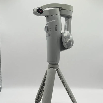 Side angle of 3-AXIS Merak One smartphone gimbal showing side zoom W T slider and clamp