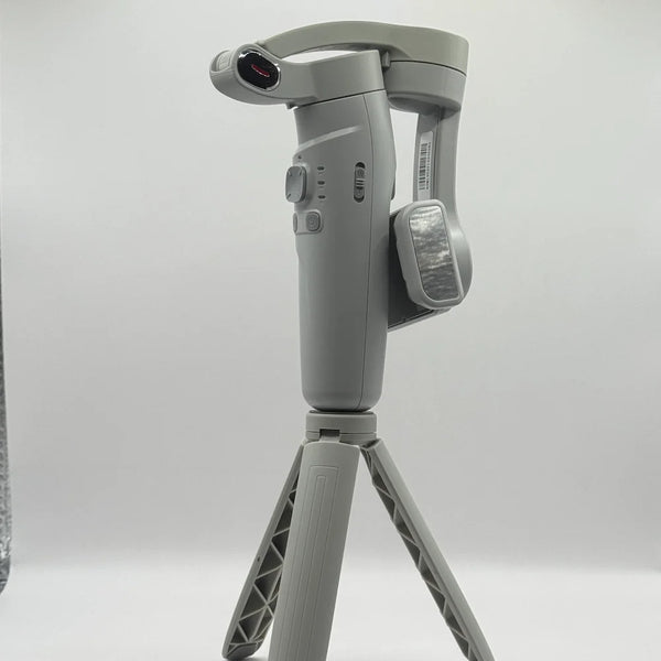 Side angle of 3-AXIS Merak One smartphone gimbal showing side zoom W T slider and clamp