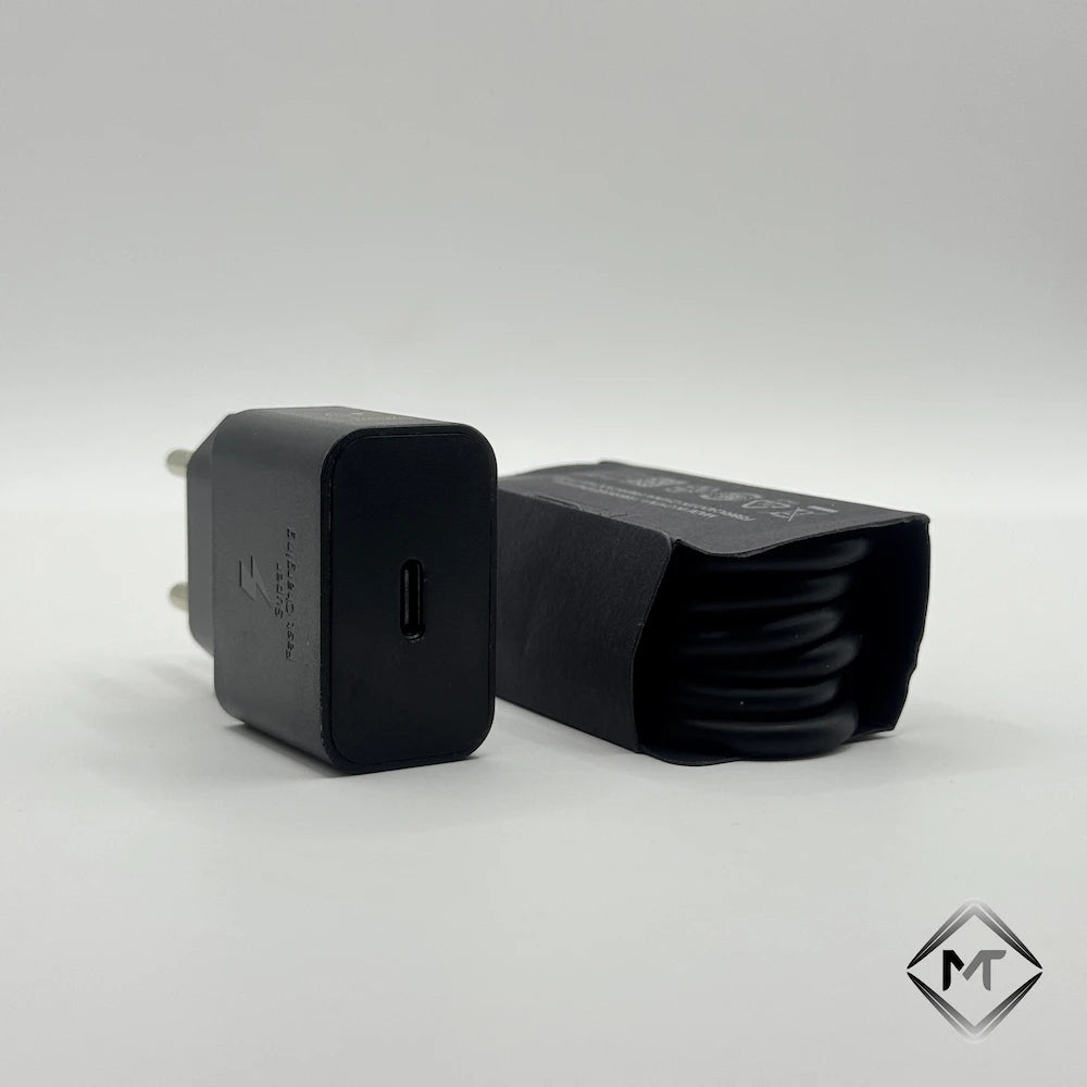 Black 25W PD charger single USB-C port top view next to packaged cable
