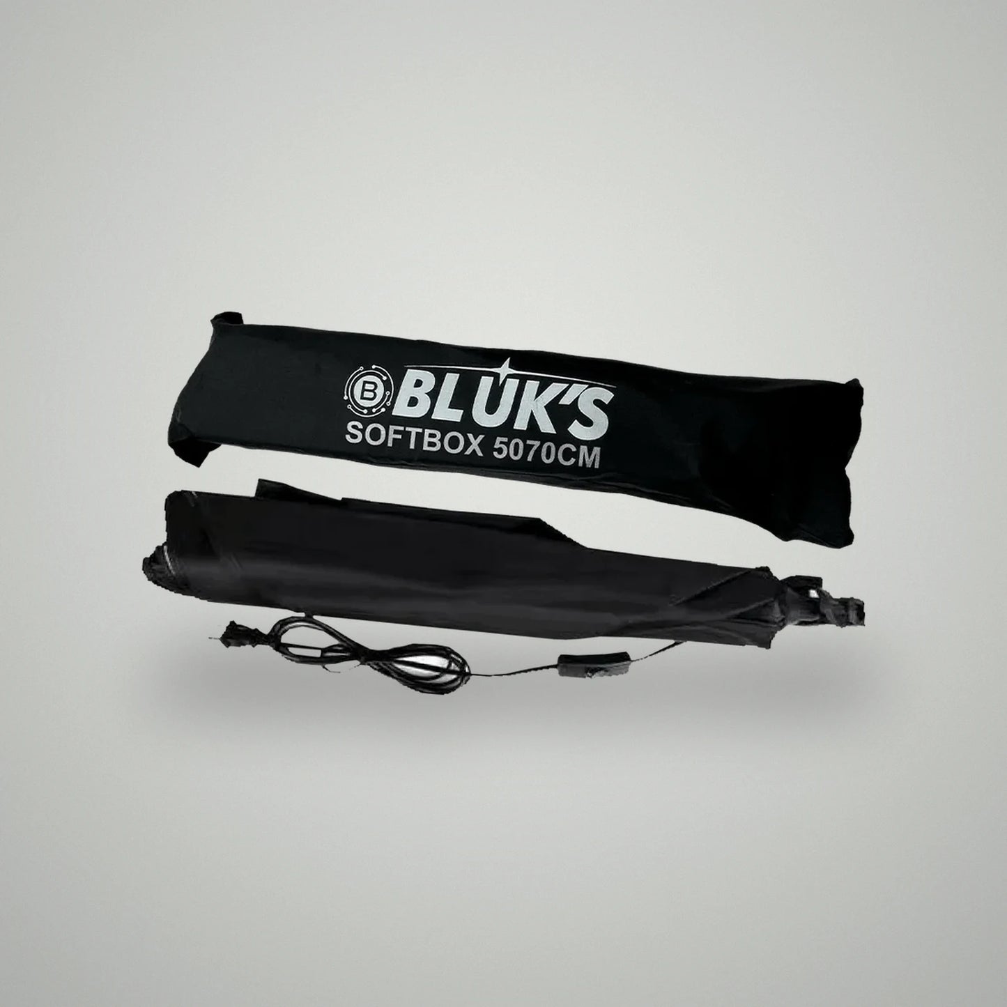 Folded BLUK'S 5070 umbrella softbox unit with integrated power cord alongside black zipped storage carry case