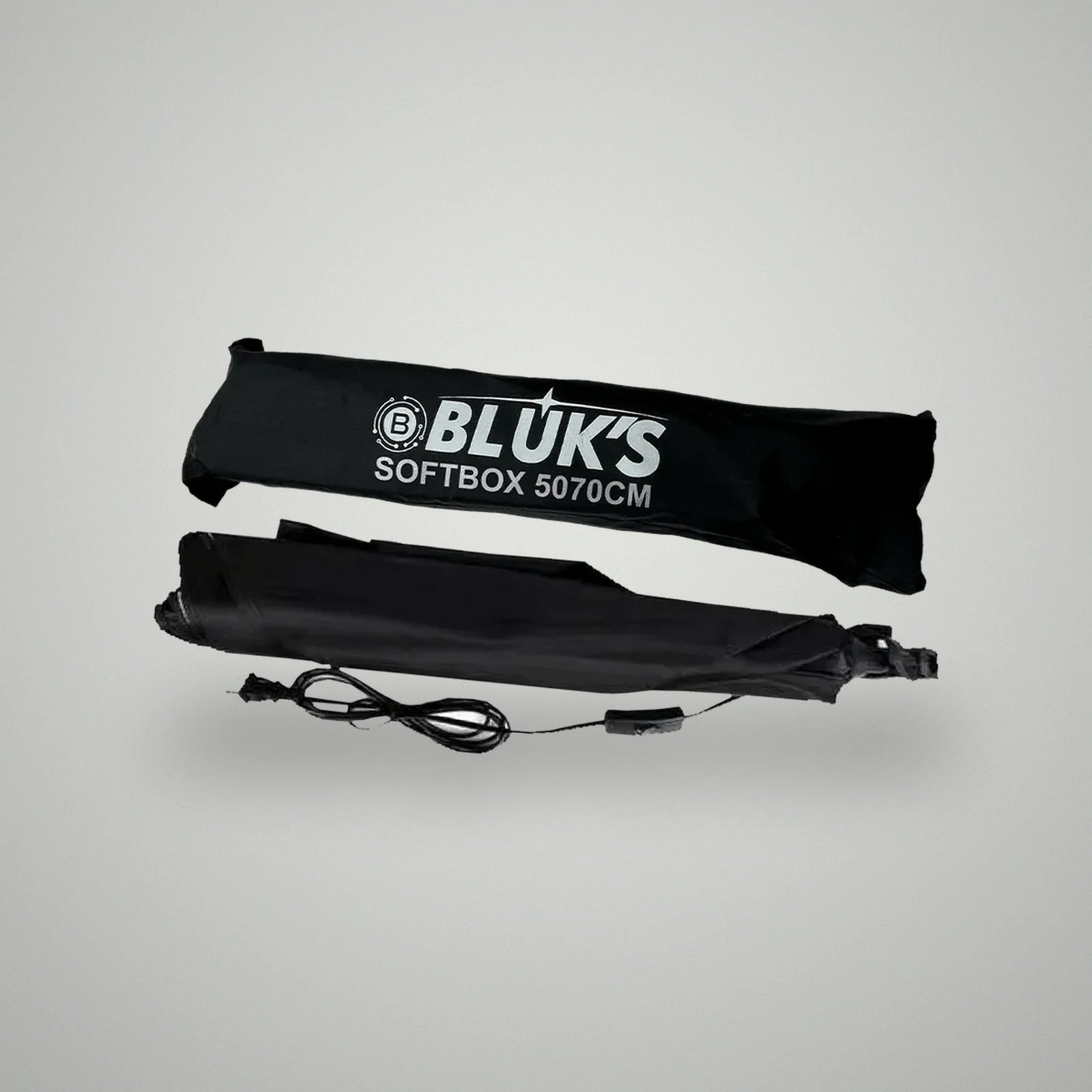 Folded BLUK'S 5070 umbrella softbox unit with integrated power cord alongside black zipped storage carry case
