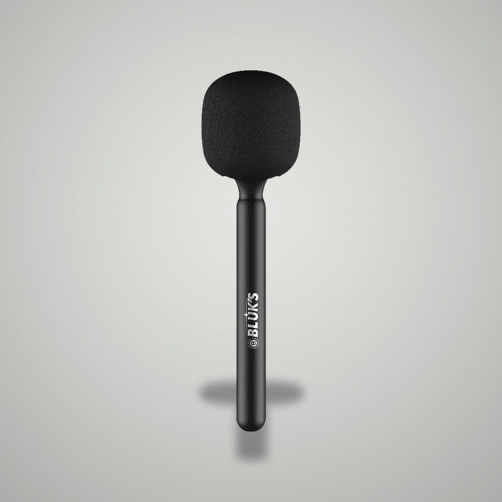 Assembled BLUK'S BX-111 handheld wireless interview microphone with black foam windscreen