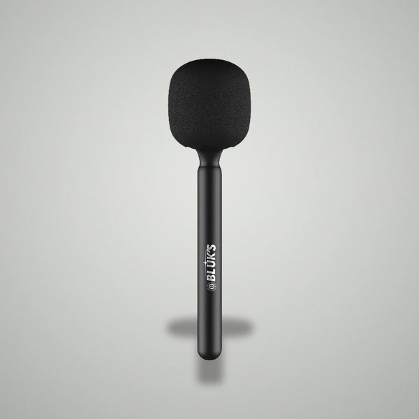 Assembled BLUK'S BX-111 handheld wireless interview microphone with black foam windscreen