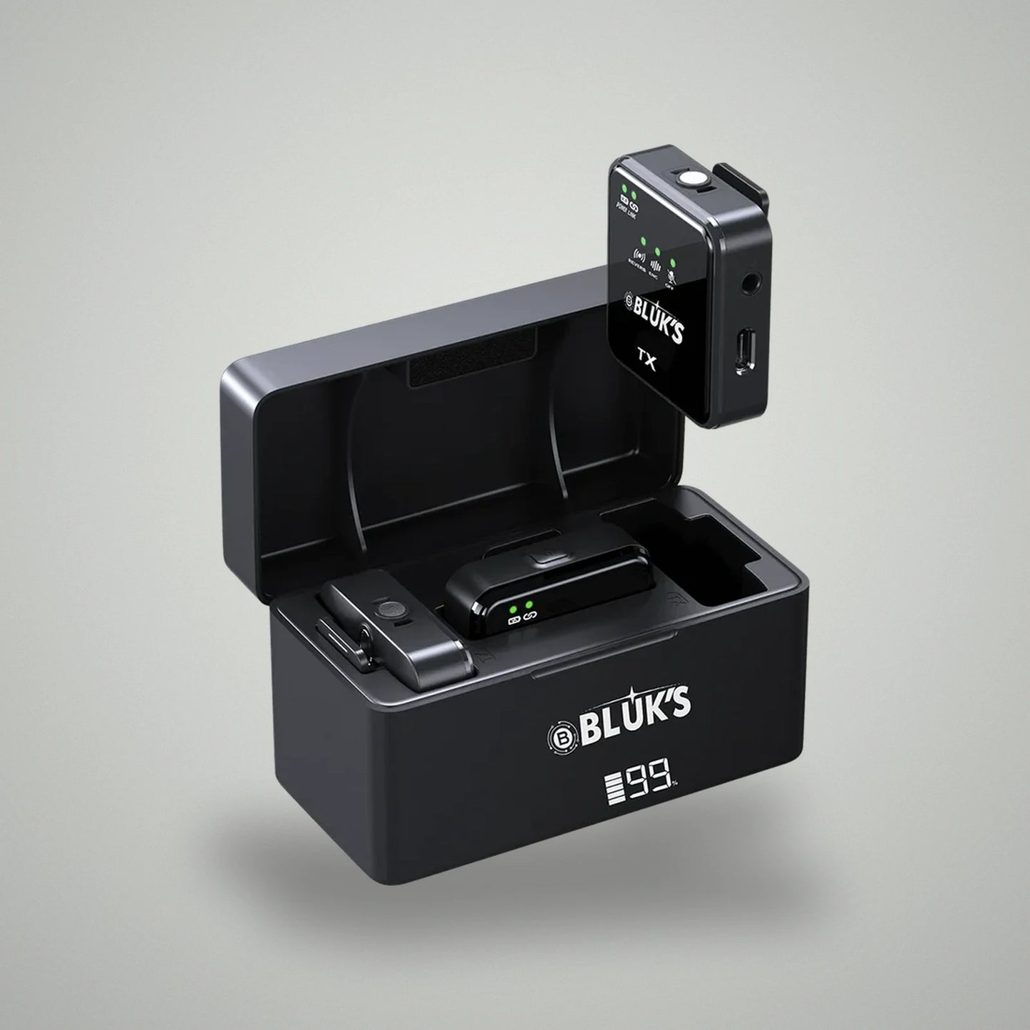 BLUK'S BX-111 transmitter unit being lifted out of digital battery display charging case