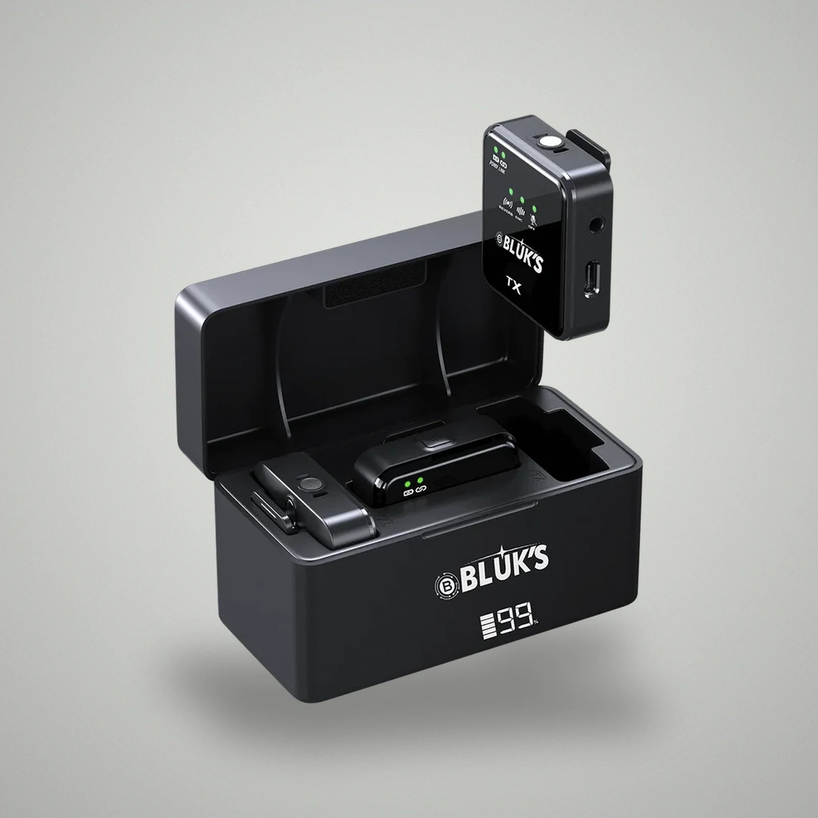 BLUK'S BX-111 transmitter unit being lifted out of digital battery display charging case