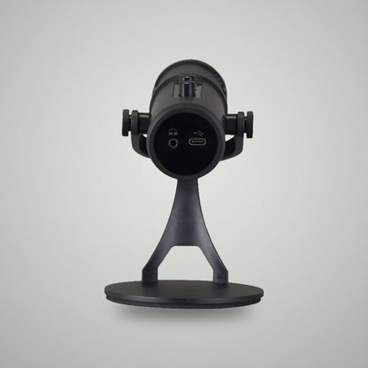 Bottom base view of BLUK'S BX-120 microphone showing 3.5mm headphone monitoring jack and USB Type-C power port