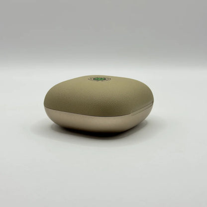 Closed textured beige and gold charging case for Bluk's BX-604 wireless earbuds