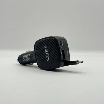 Side perspective of Bluk's BX-653 black car charger featuring carbon fiber design and 50W power marking