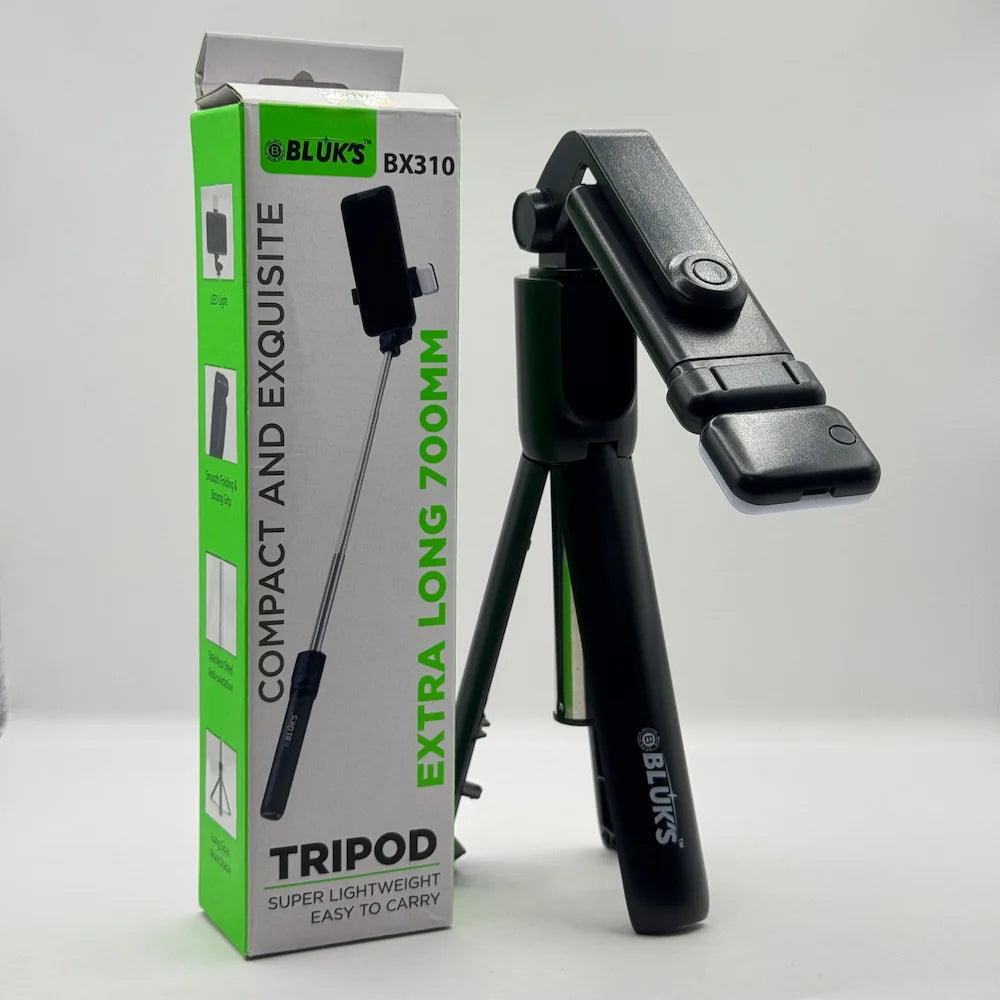 Bluk's BX310 portable tripod selfie stick standing beside its original retail product box