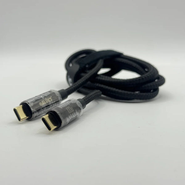Close up view of BLUK'S BX471 aluminum alloy connectors showing 100W logo and gold plating