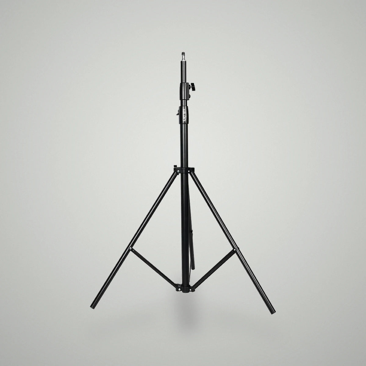 Heavy-duty black metallic studio light stand extended with 3-leg tripod base and mounting pin