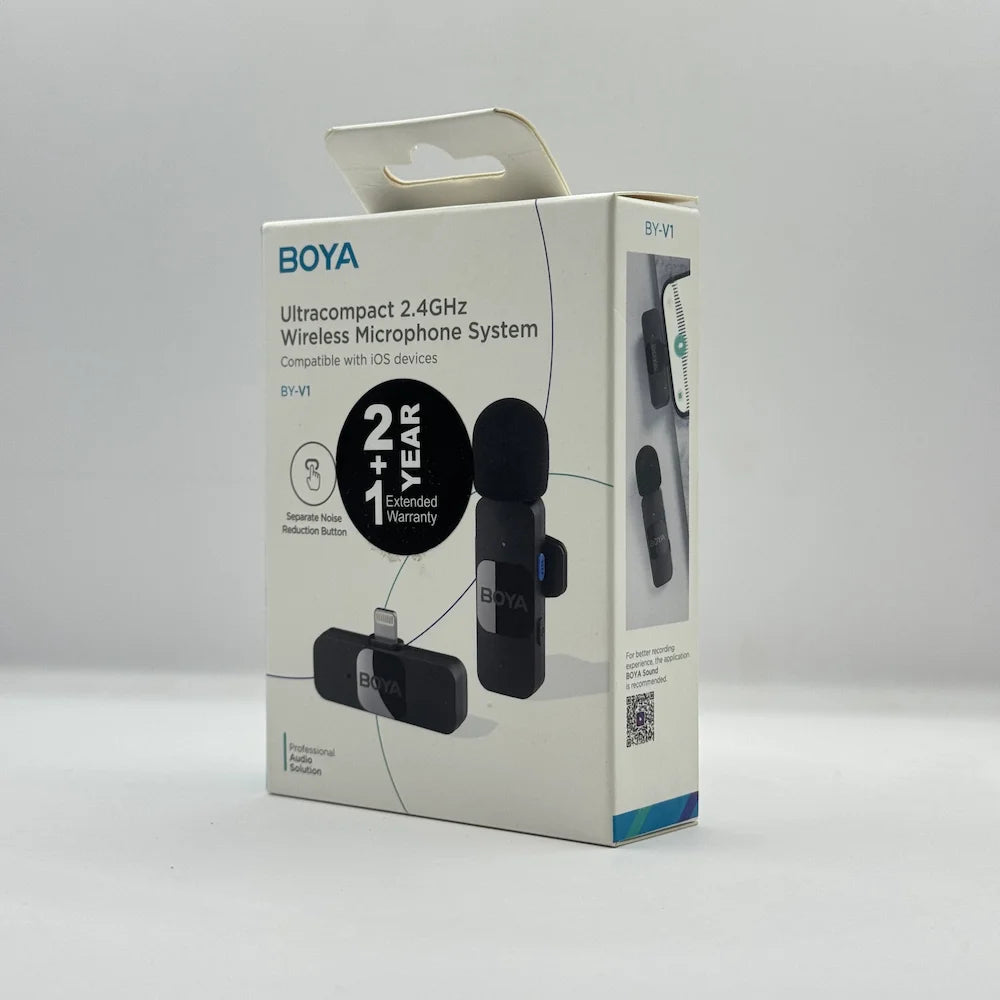 Front packaging box of BOYA BY-V1 ultracompact 2.4GHz wireless microphone system compatible with iOS devices featuring 2+1 year extended warranty badge