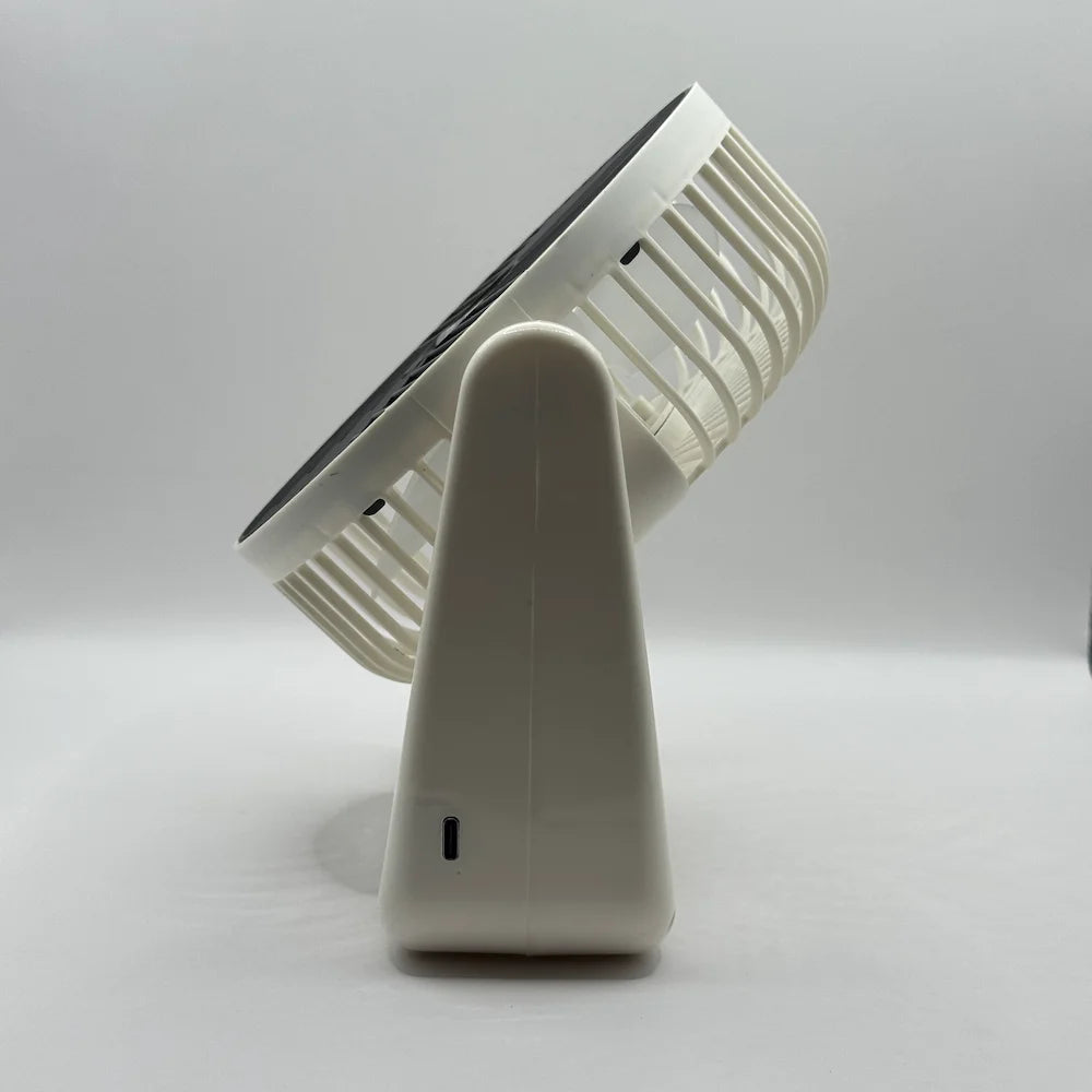Side profile view of cream desktop circular fan highlighting the Type-C USB charging port