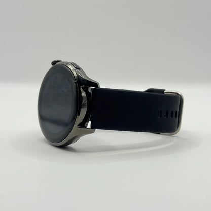 Side angled view of Haino Teko RW-10 smartwatch showing glossy dark metallic circular casing and screen