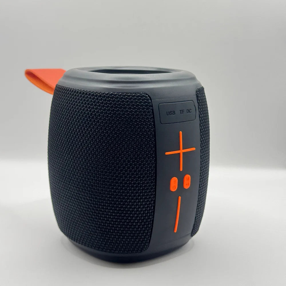 Front view of HM-805 portable speaker showing orange control buttons