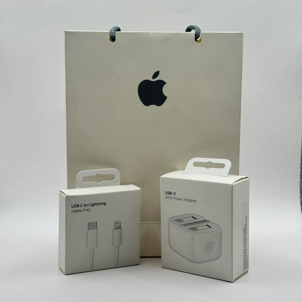 iPhone 20W USB-C Power Adapter and Lightning Cable boxes in front of paper bag