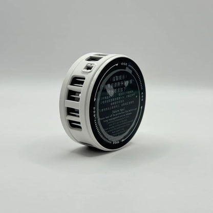 Rear view of K51 mobile phone cooler showing the circular magnetic semiconductor cooling plate with protective film text