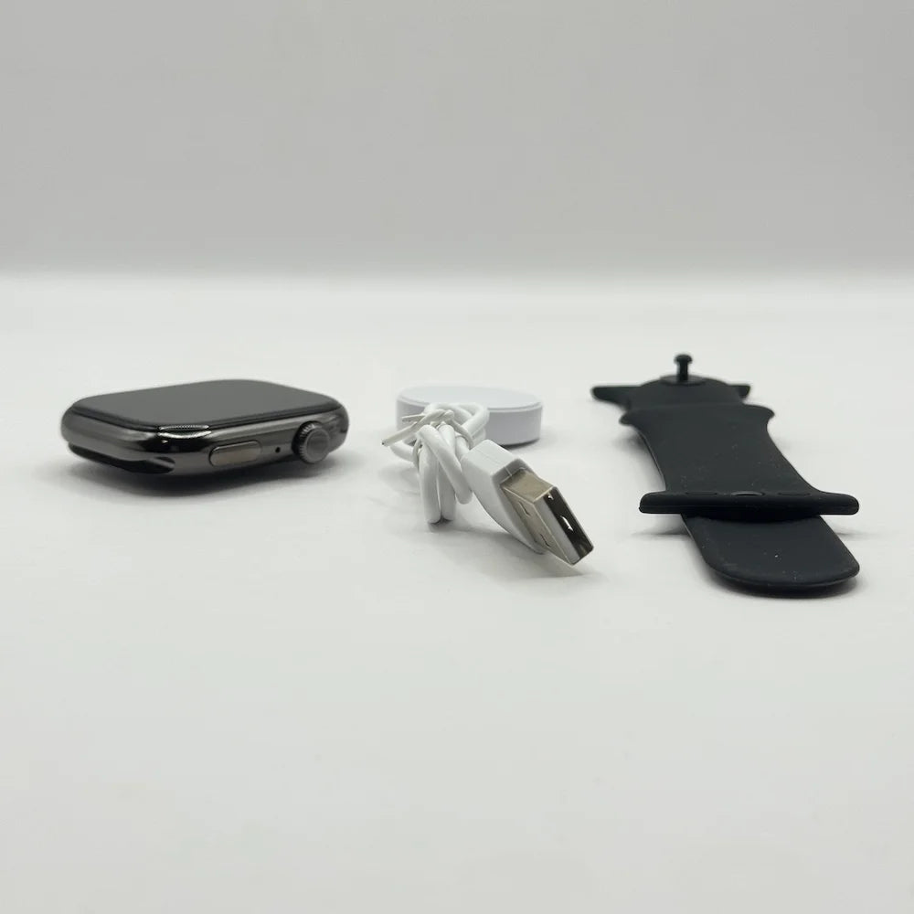 Laxasfit Watch 10 Max smartwatch components separated showing dark metallic dial, magnetic wireless charger, and black strap