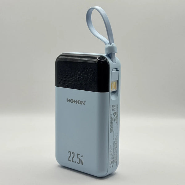 Front perspective view of NOHON LS-DY259 22.5W power bank in light blue color with digital display