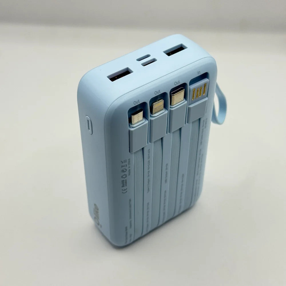 Perspective top-down view of Olike P402 power bank displaying tucked built-in cable heads and top port layout