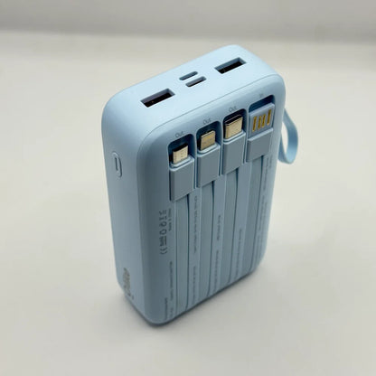 Perspective top-down view of Olike P402 power bank displaying tucked built-in cable heads and top port layout