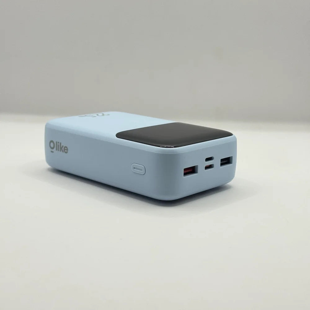 Top edge view of Olike P402 power bank showing dual USB-A output ports alongside Type-C and Lightning input ports