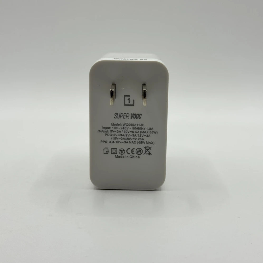 OnePlus 1+ SuperVOOC 65W power adapter specifications and model WC065A11JH back view
