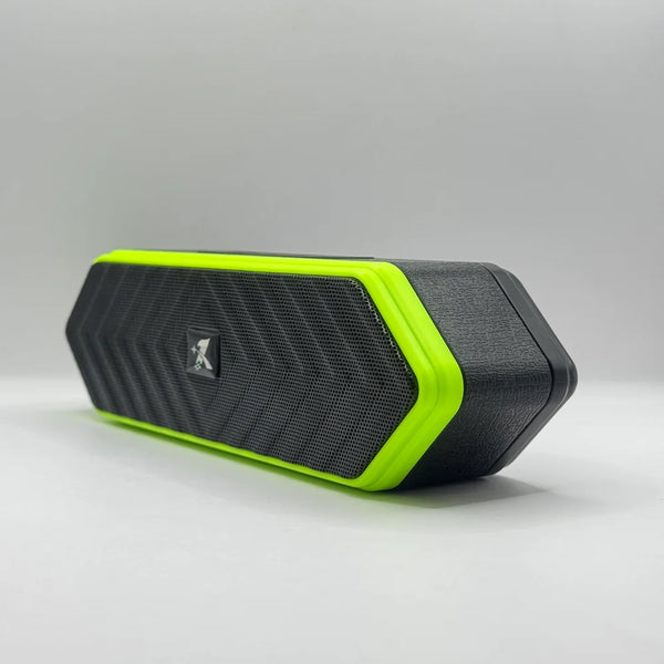 Side angle of black portable soundbar-style wireless Bluetooth speaker featuring bright neon green rubber trim