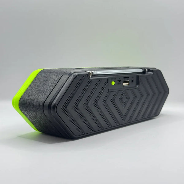Rear view of portable wireless speaker showing textured black casing and folded FM radio antenna