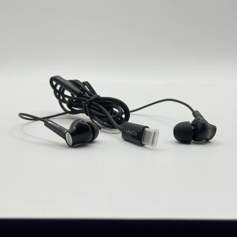Ronin R-29 Stellar black earpieces displayed next to Type-C jack and in-line control module