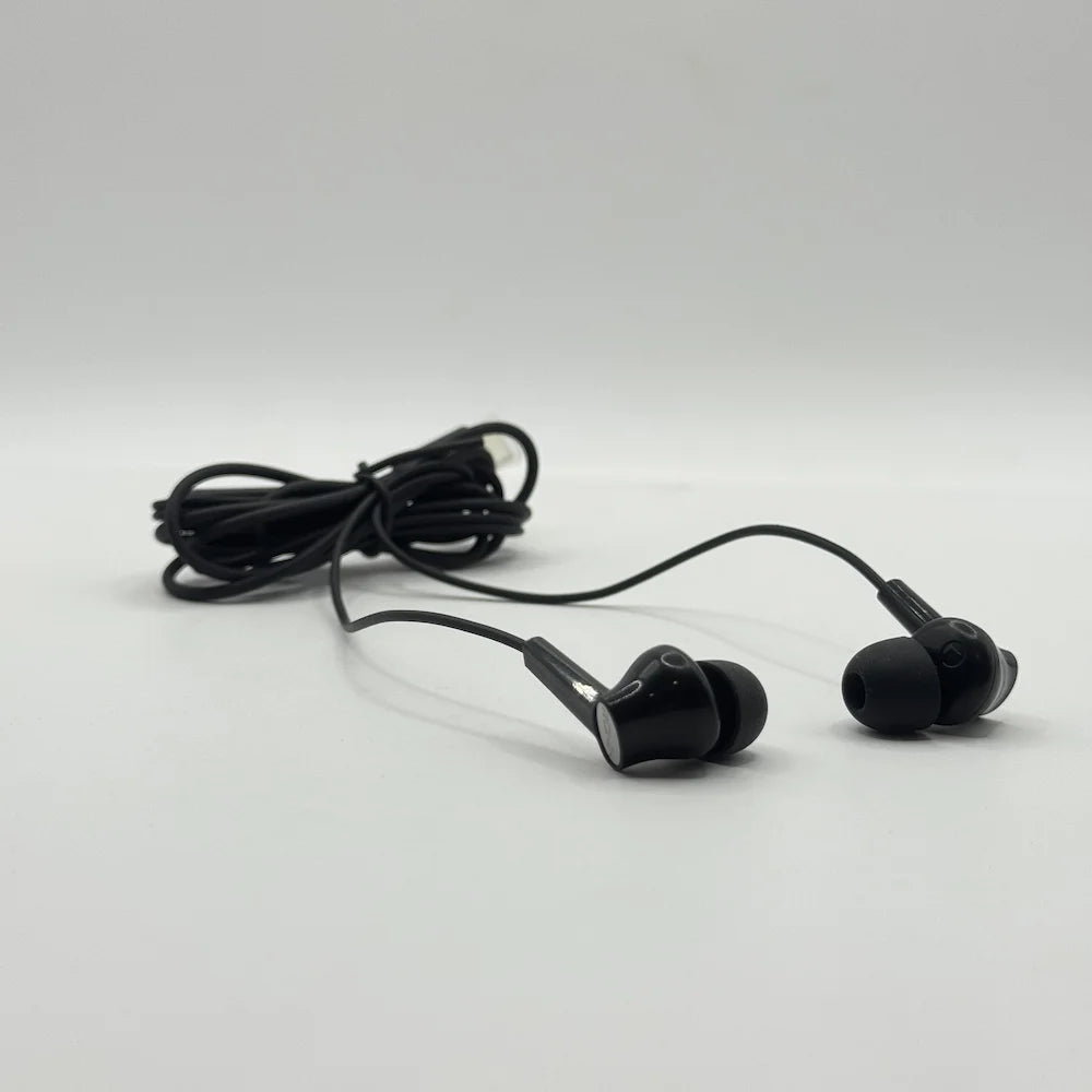 Ronin R-29 Stellar black Type-C in-ear earbuds positioned with coiled connection wire