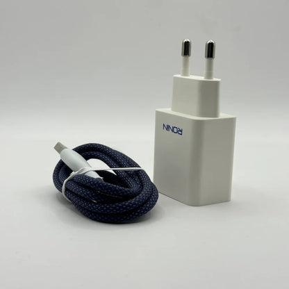 Standalone Ronin R-615 Encore white wall plug charger positioned beside durable coiled braided cable
