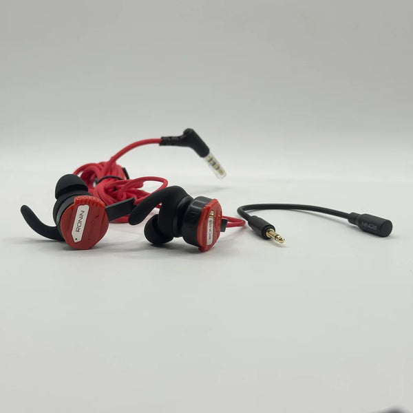 Ronin R-860 Chaos gaming earbuds positioned beside detachable boom microphone