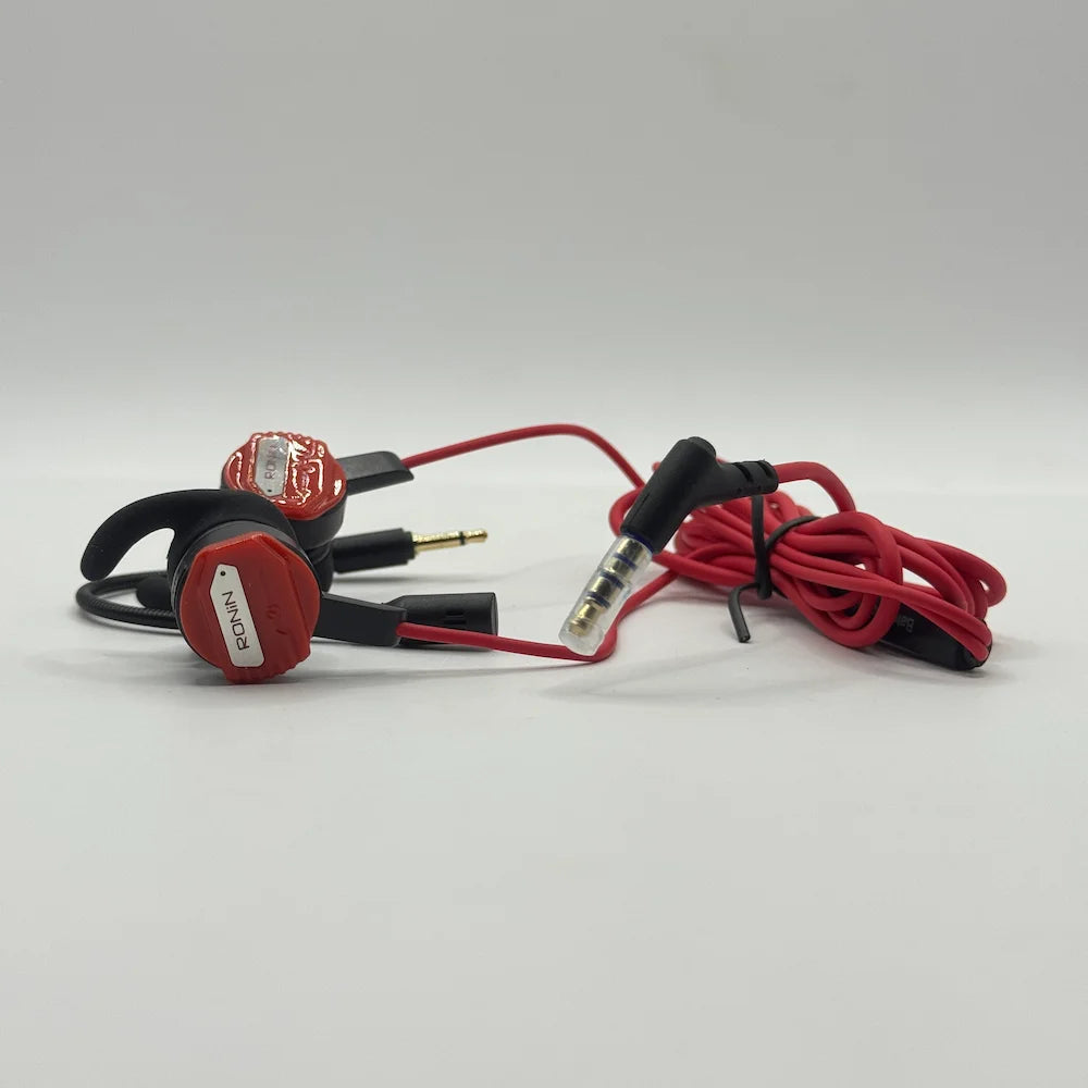 Close up view of Ronin R-860 Chaos red earbuds and 3.5mm audio jack connector