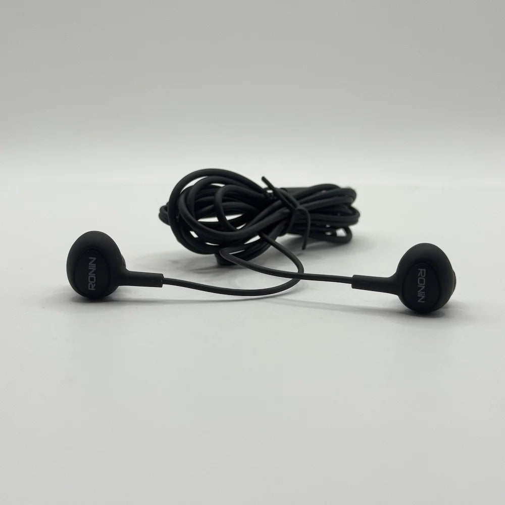 Front view of Ronin R-9 black earpieces with coiled cable showing Ronin branding