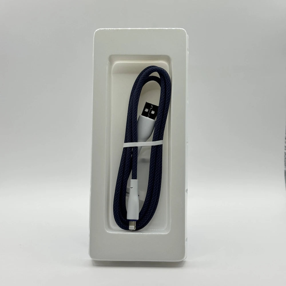 Dark blue braided Ronin R-2025 Lightning cable in inner packaging tray