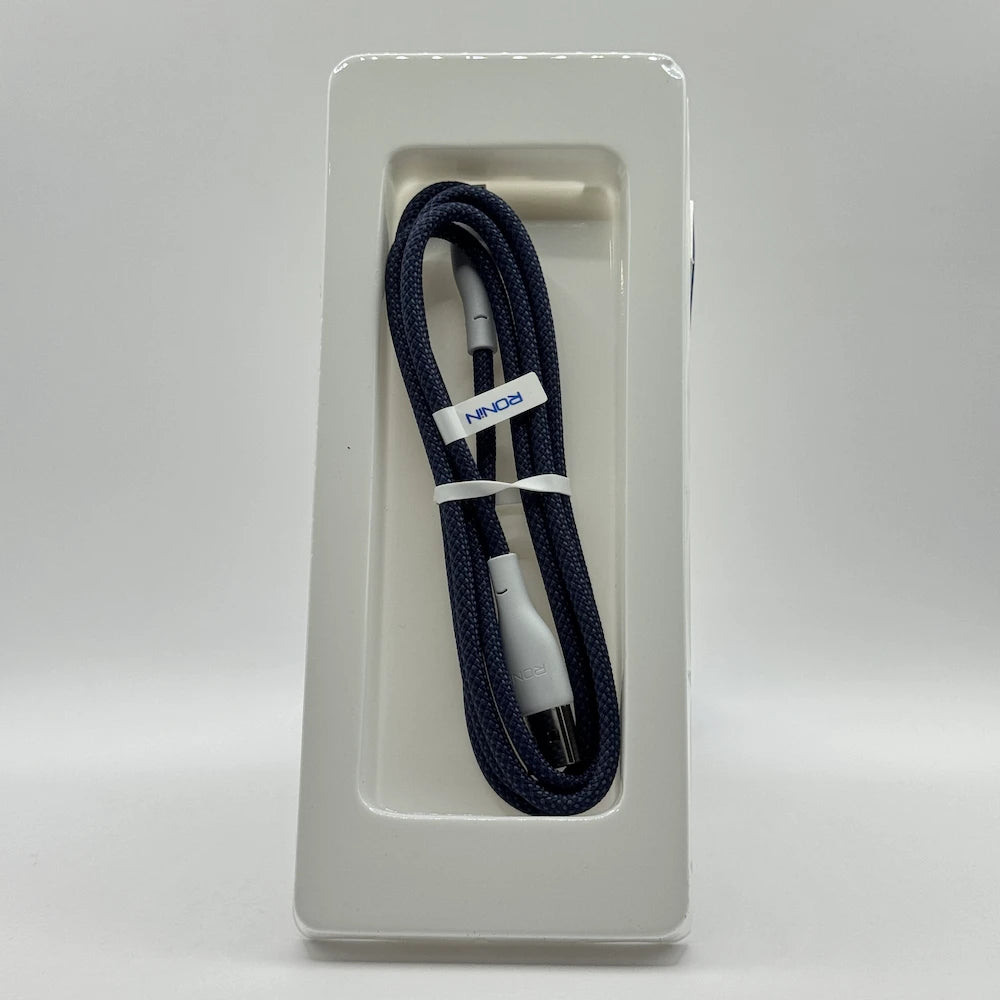 Dark blue braided Ronin R-2025 micro USB cable in inner packaging tray