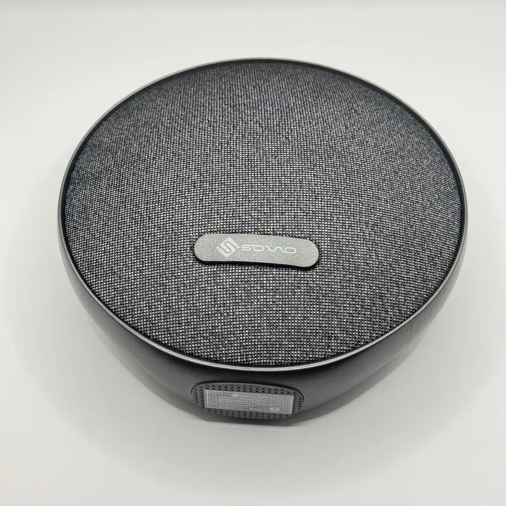 Top down flat lay view of SOVO BEAT SBS-505 round bluetooth speaker with brand logo