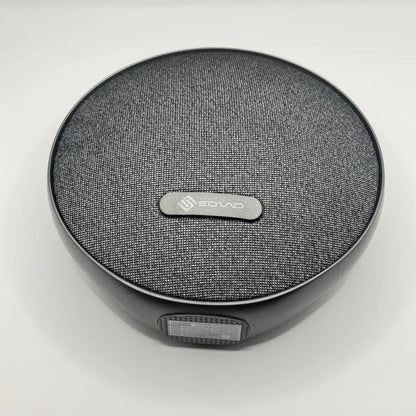 Top down flat lay view of SOVO BEAT SBS-505 round bluetooth speaker with brand logo