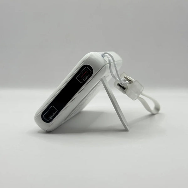 Side perspective of SOVO SPB-614 showing Type-C and Lightning ports supported by folded kickstand