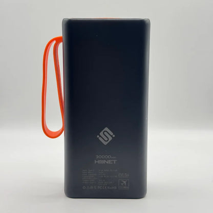 Back view of black SOVO SPB-677 30000mAh power bank showing technical input output specs and airline approved rating