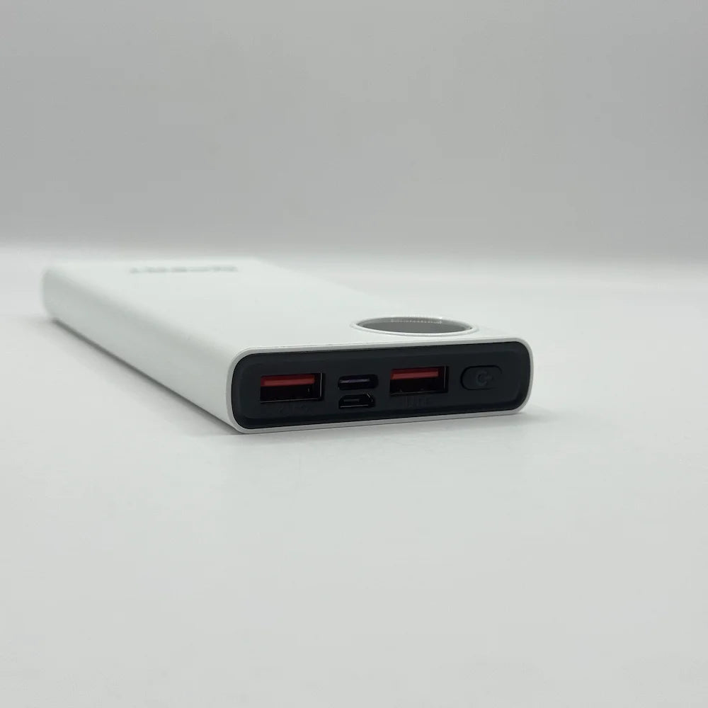 Close up front angle of XPERT XP-411 power bank input and output ports including USB Type-C and Micro USB