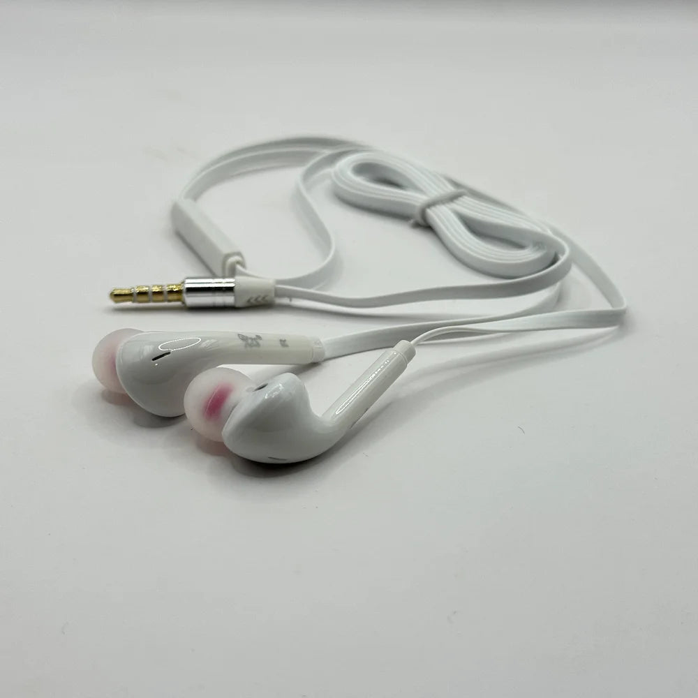 Close up shot of XZS HiSpeed X-68 white in-ear earbud tips with gold plated 3.5mm plug