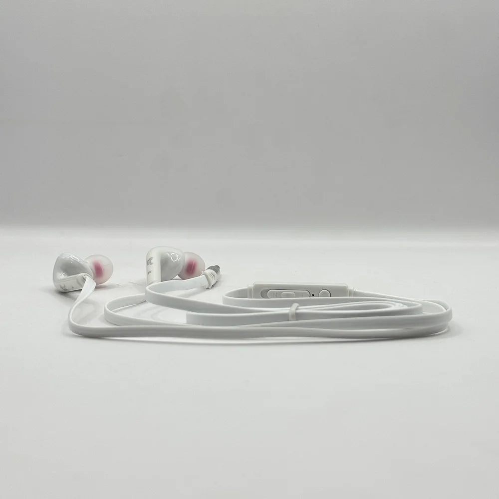 Side perspective view of XZS HiSpeed X-68 white stereo earphones lying on a clean background